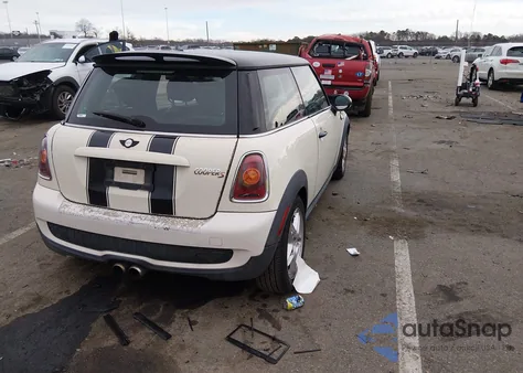2009 Mini Cooper S from USA, damaged, VIN WMWMF73559TW83452
